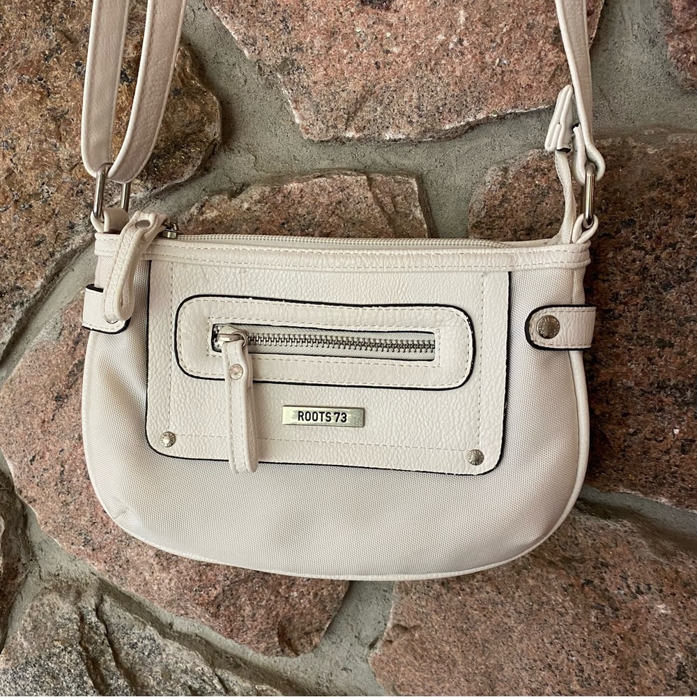 White Roots cross body bag.